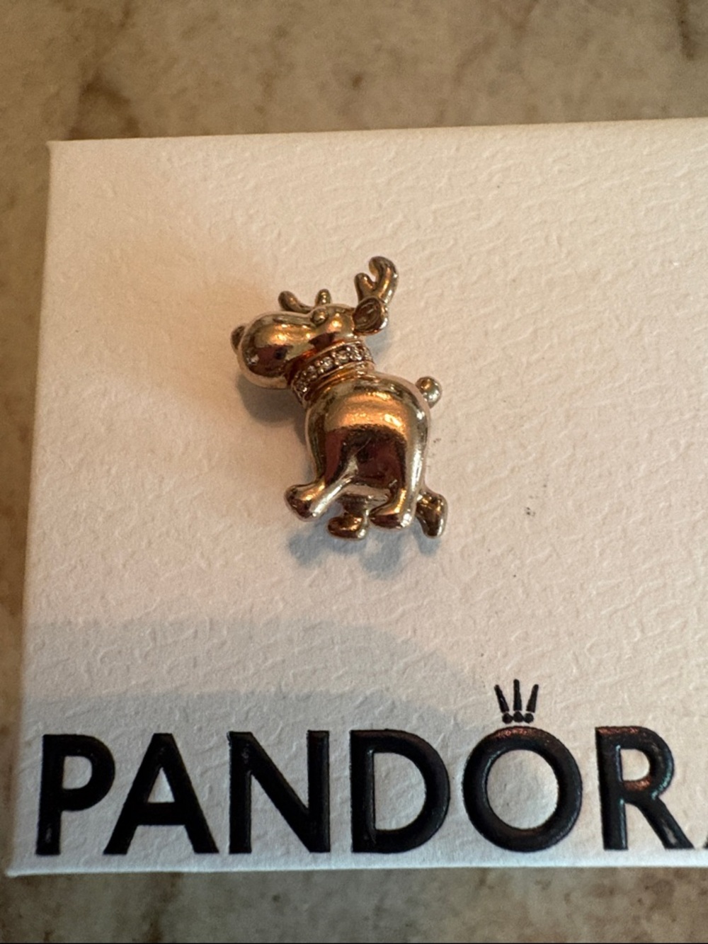 Pandora rose gold reindeer with cz’s